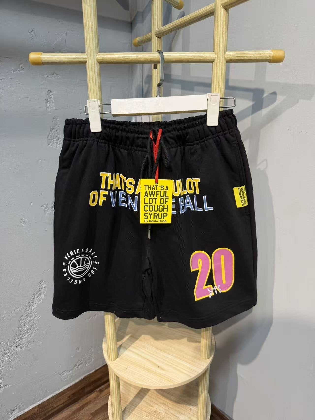 THAT'S A AWFUL LOT OF COUGH SYRUP Venice Ball Graphic Shorts — front